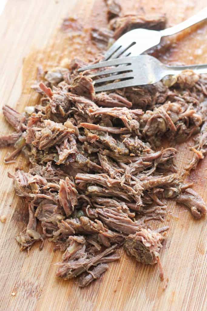shredded beef with two forks