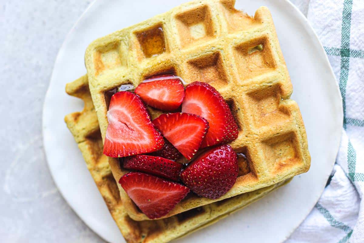 top view of two waffles with berries on top