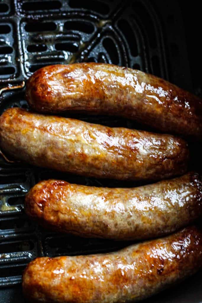 cooked browned brats sausage in air fryer