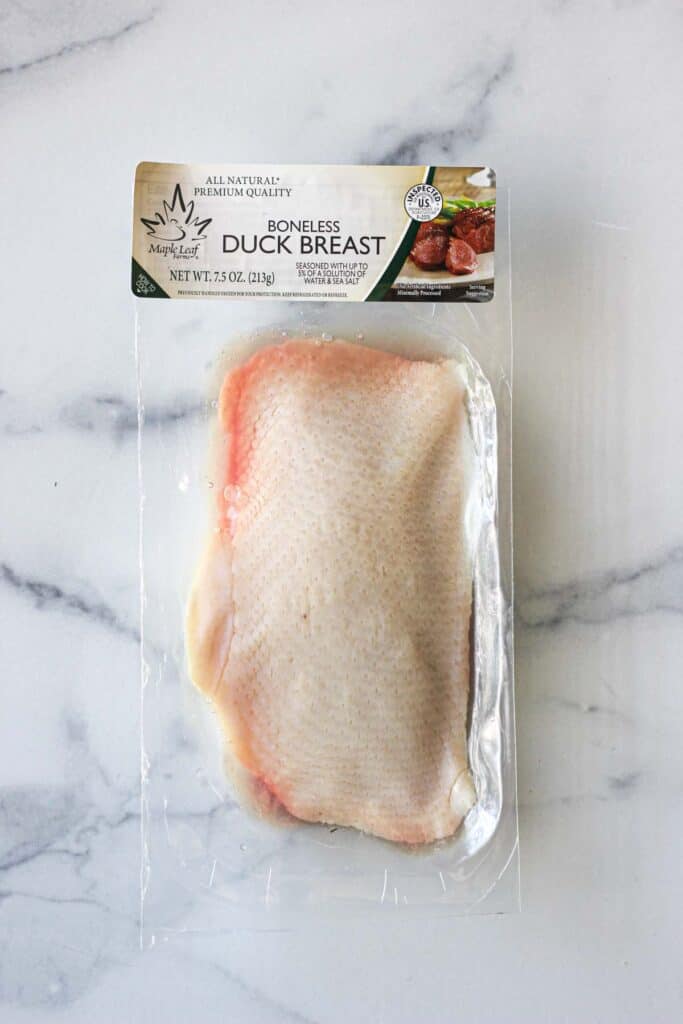 the package of raw vacuume sealed duck breast