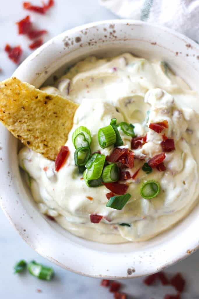 chopped jerkey and scallions on top of the dip in the bowl