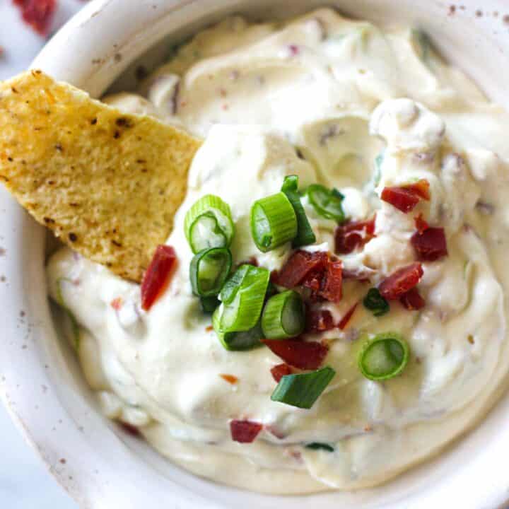 chopped jerkey and scallions on top of the dip in the bowl