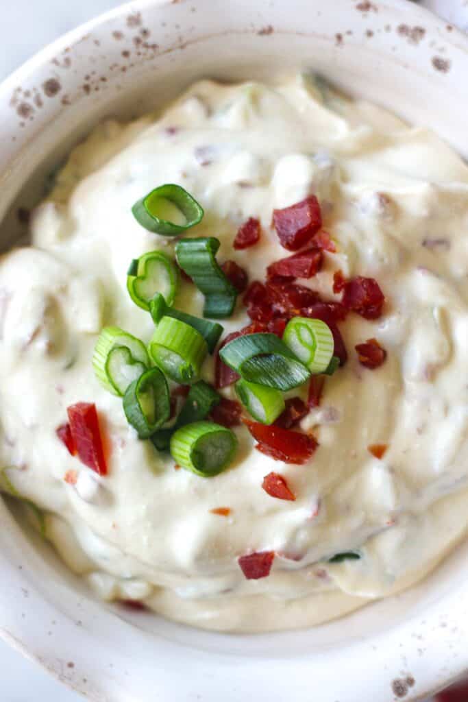 a bowl full of warm beef dip