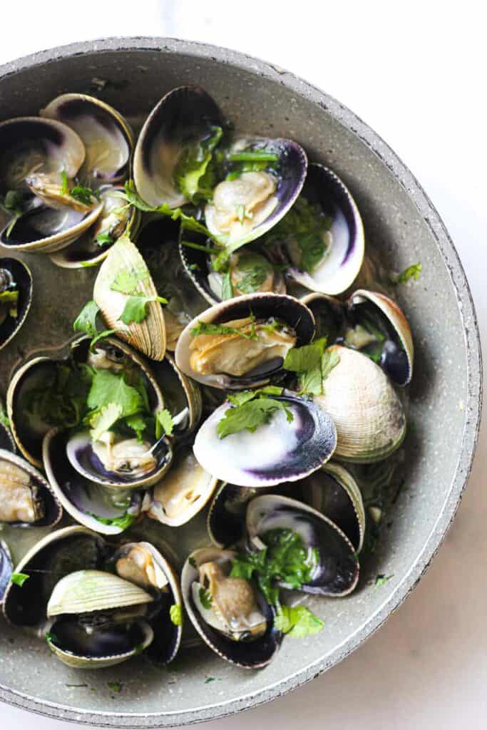 cooked cockles in a pan