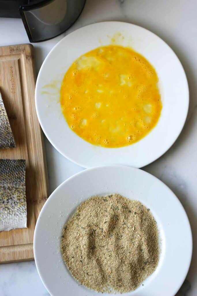 whisked eggs and bread crumbs in a plate