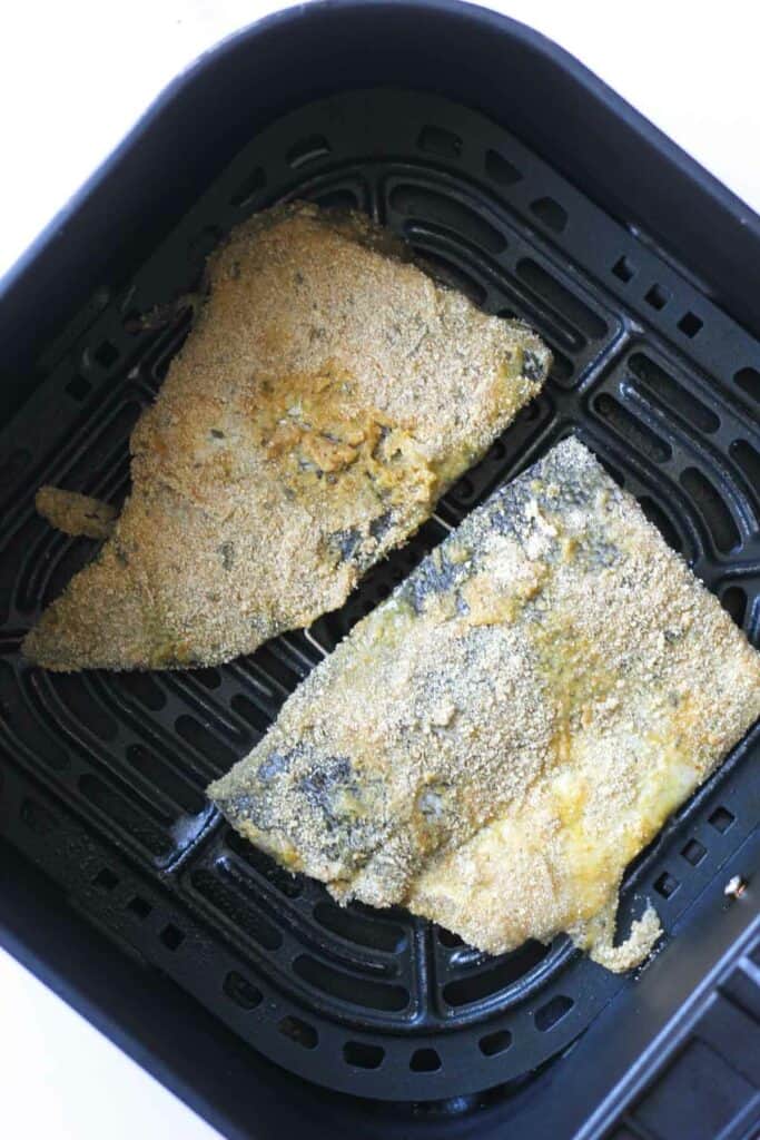 raw walleye fish in the air fryer basket