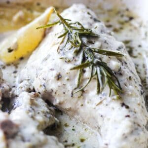 juicy rabbit coked in the oven with herbs and lemon