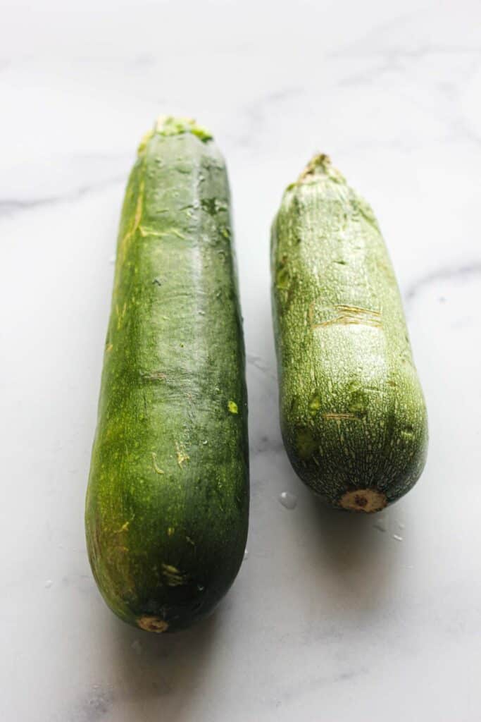 two zucchinis on a table