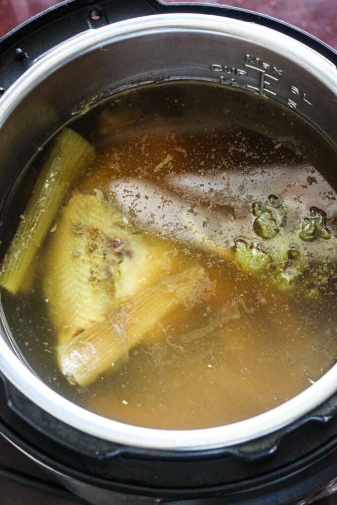cooked stewing hen soup broth in instant pot