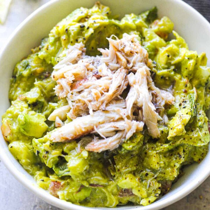 guacamole with crab meat in a bowl
