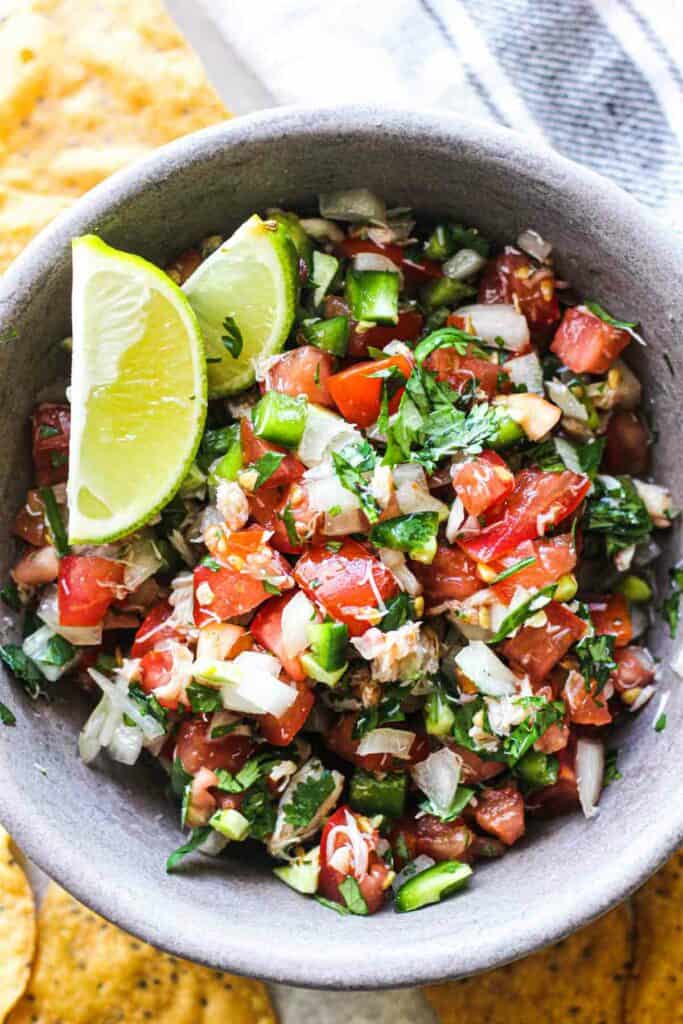 chopped pico de gallo vegetables with crab claw meat