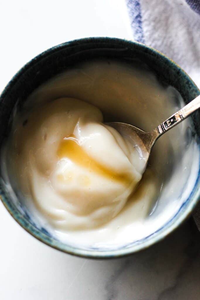 maple aioli sauce in a small blue bowl