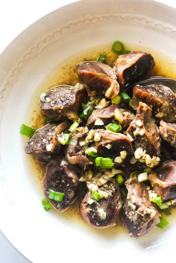 oven baked turkey gizzards with garlic and green onions