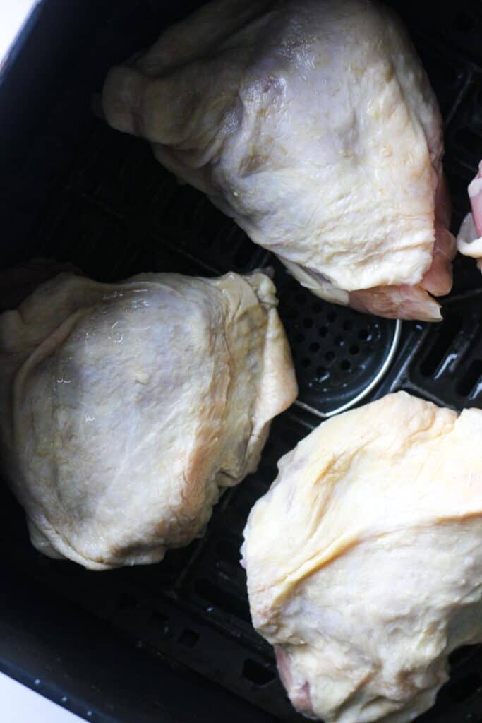 raw poultry in air fryer basket
