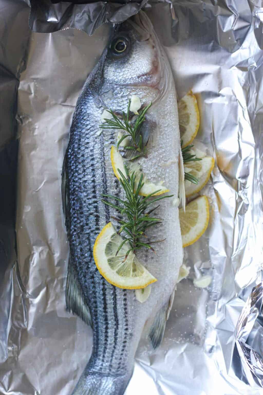 Baked whole striped bass in foil The Top Meal