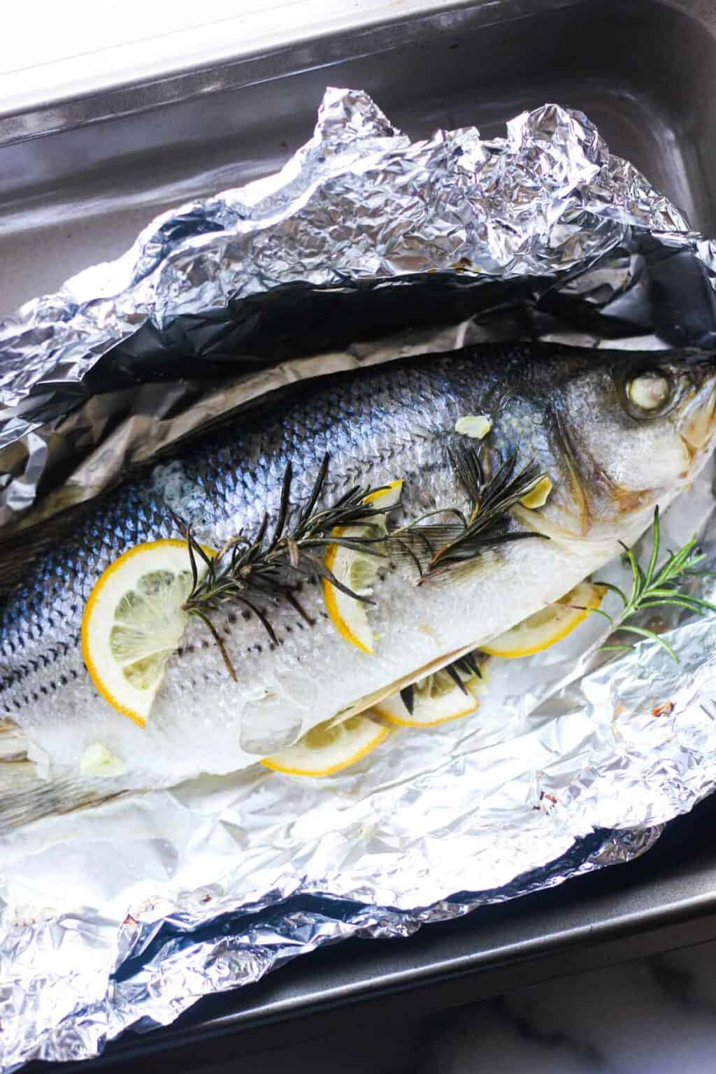 Baked whole striped bass in foil The Top Meal