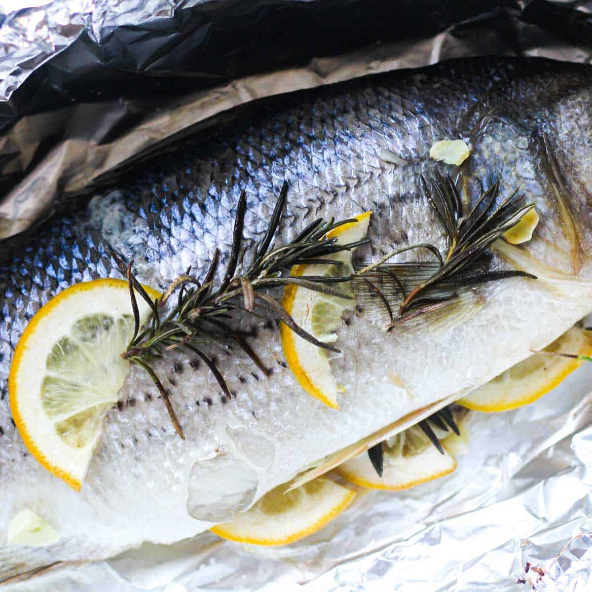 Baked whole striped bass in foil - The Top Meal