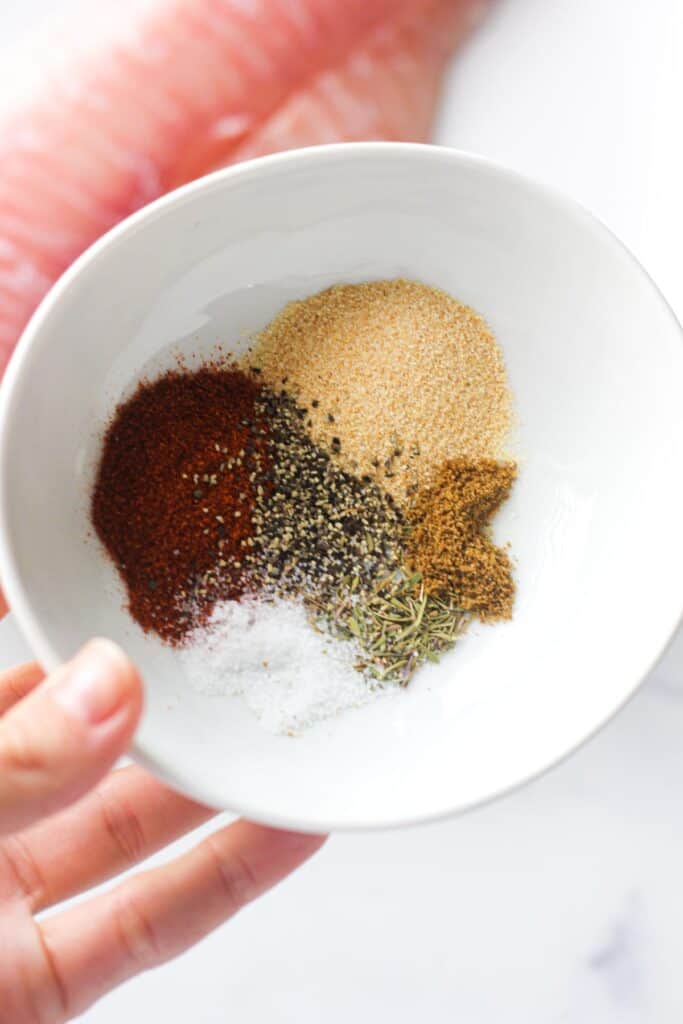 spices in a small bowl in hand