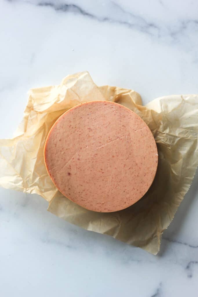 whole thick piece of bologna with wrapping