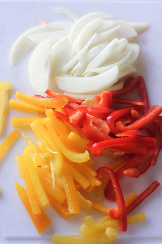 sliced onions and two colored bell peppers