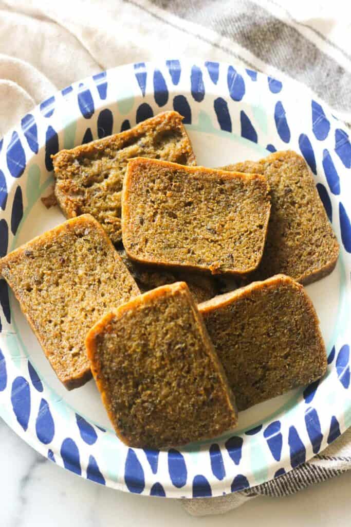 how to cook scrapple and slice in on the white paper plate