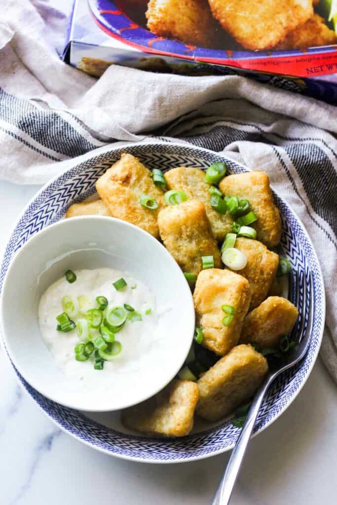 trader joes fish nuggets served with white sauce