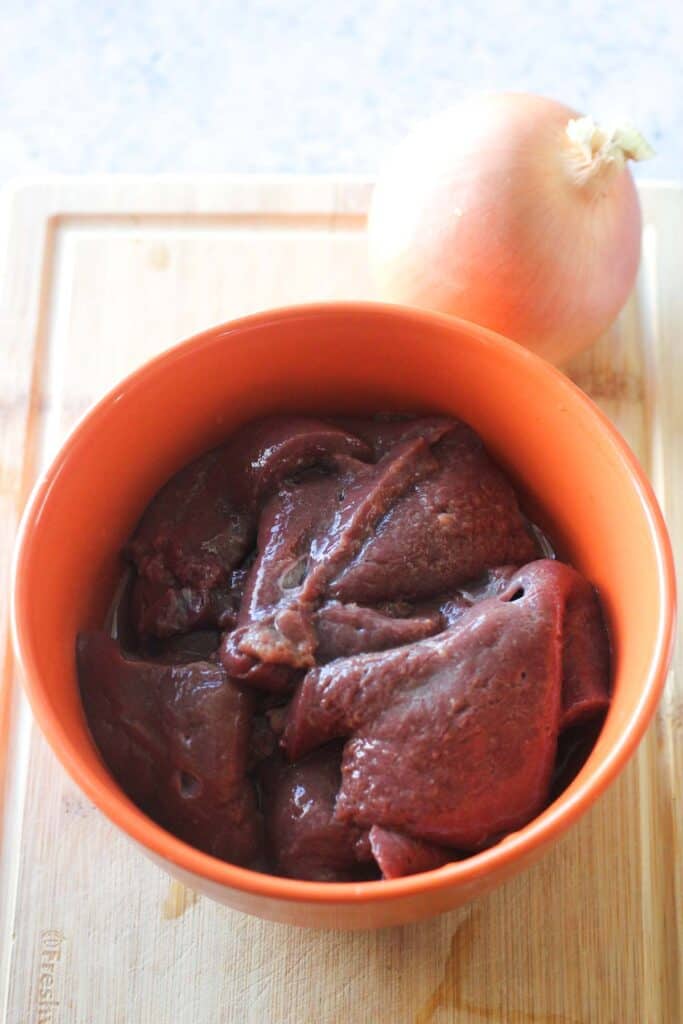 raw beef liver chunks in the bowl