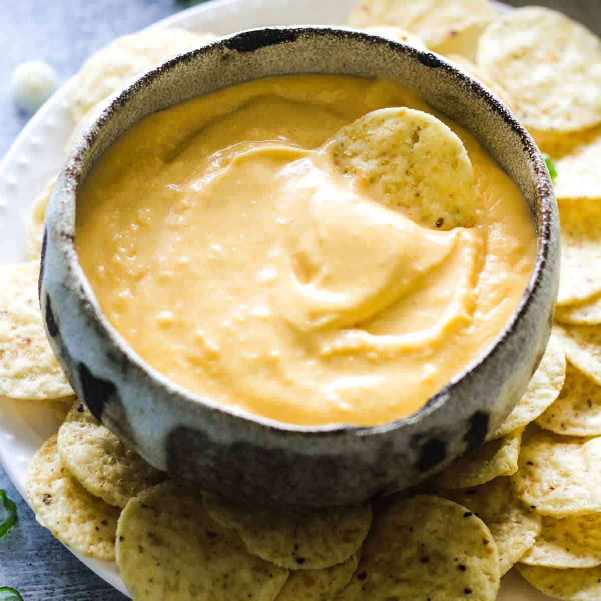mexican chiquito cheese dip in the bowl with chips