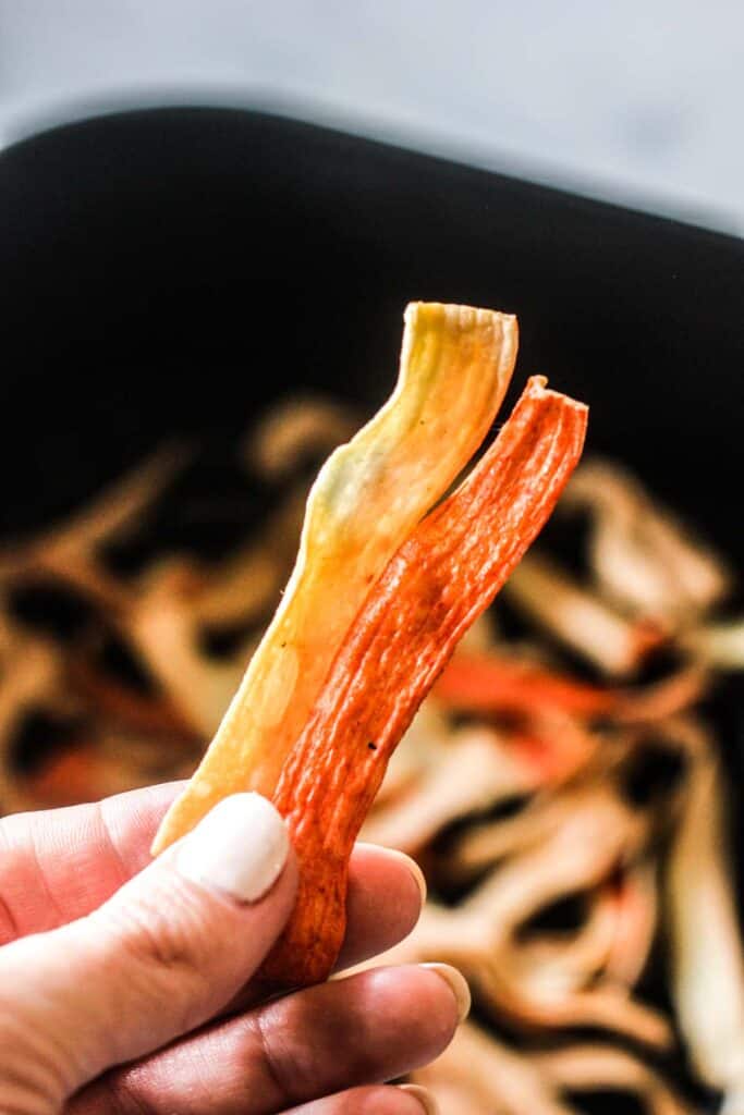 air fried crab sticks in hand