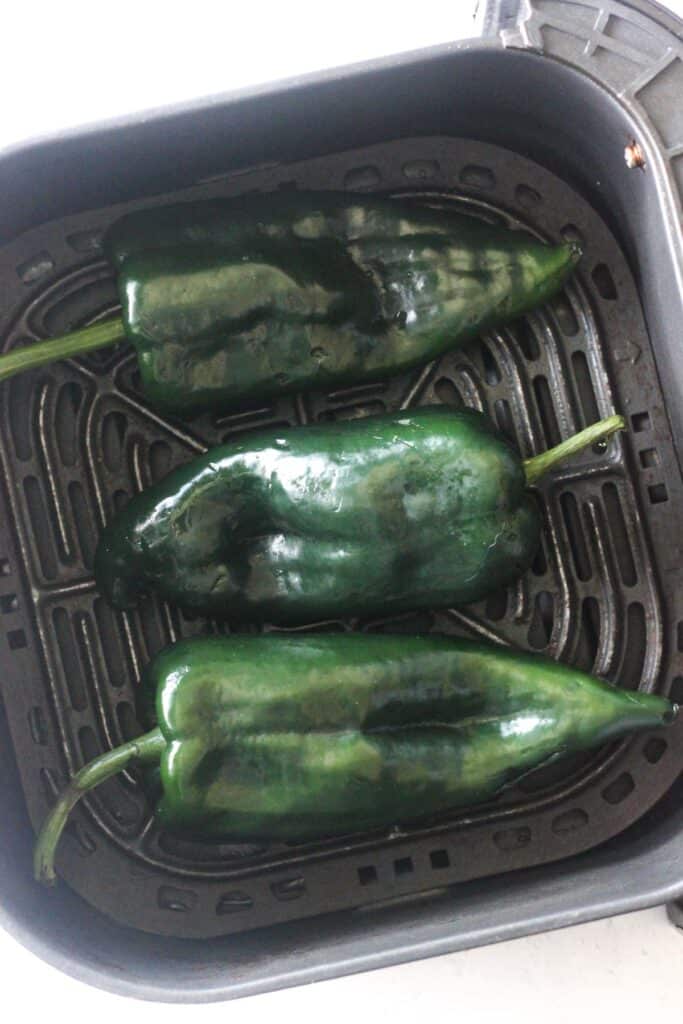 raw peppers in air fryer basket