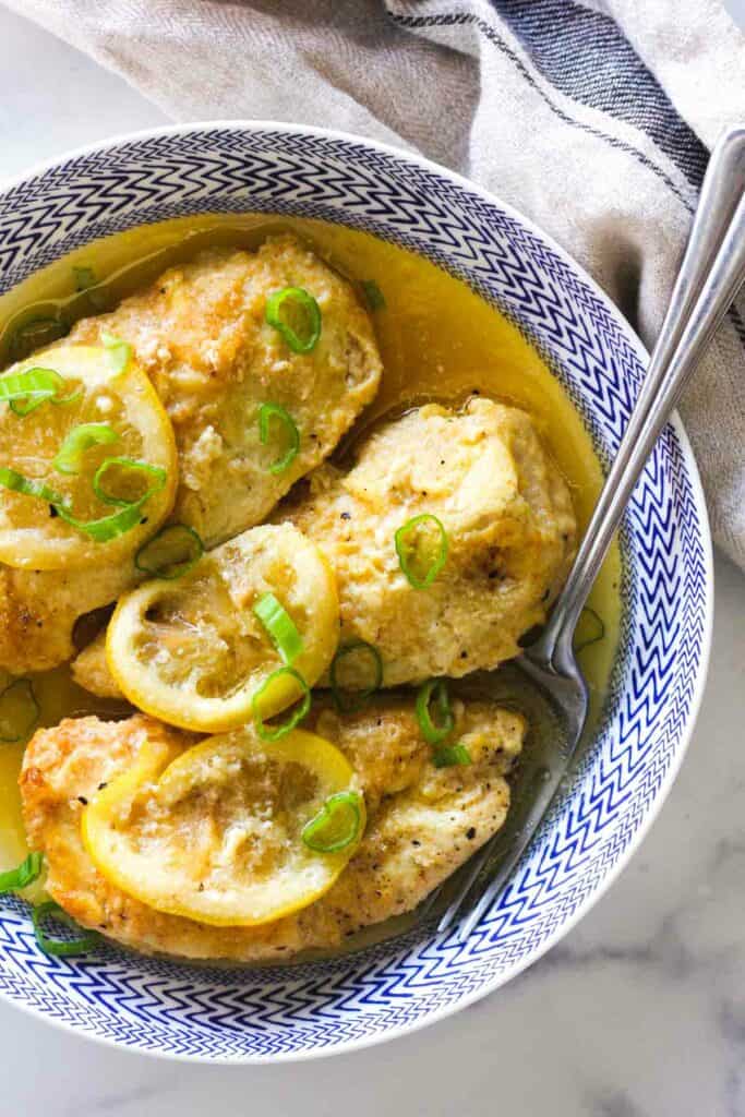 slow cooker chicken francese in a blue bowl