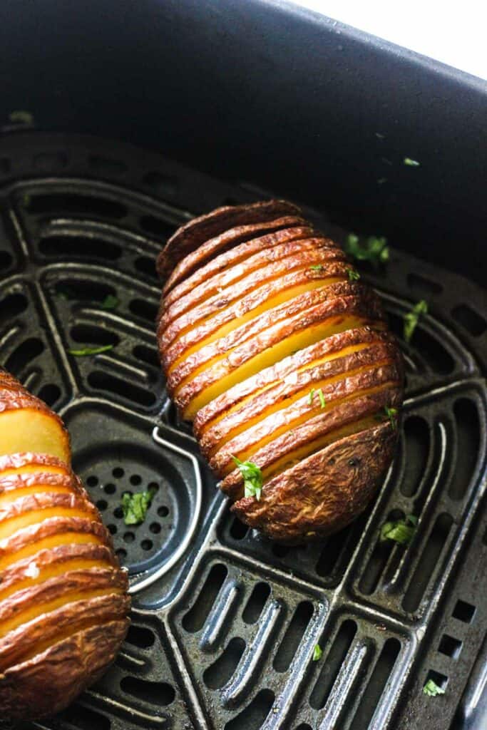 two potatoes roasted in air fryer