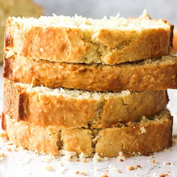 sliced stack of triple coconut quick bread