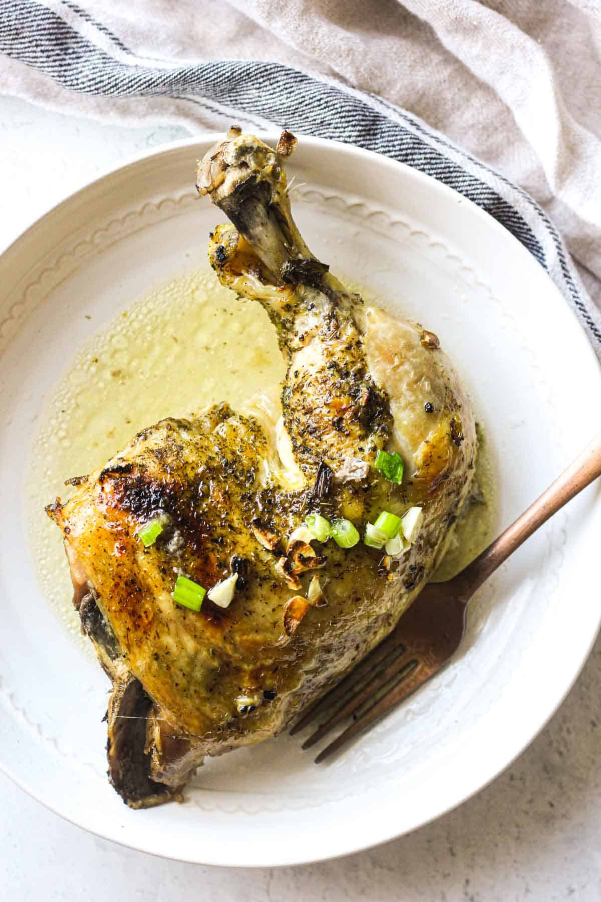 instant pot chicken quarters cooked and served in a plate