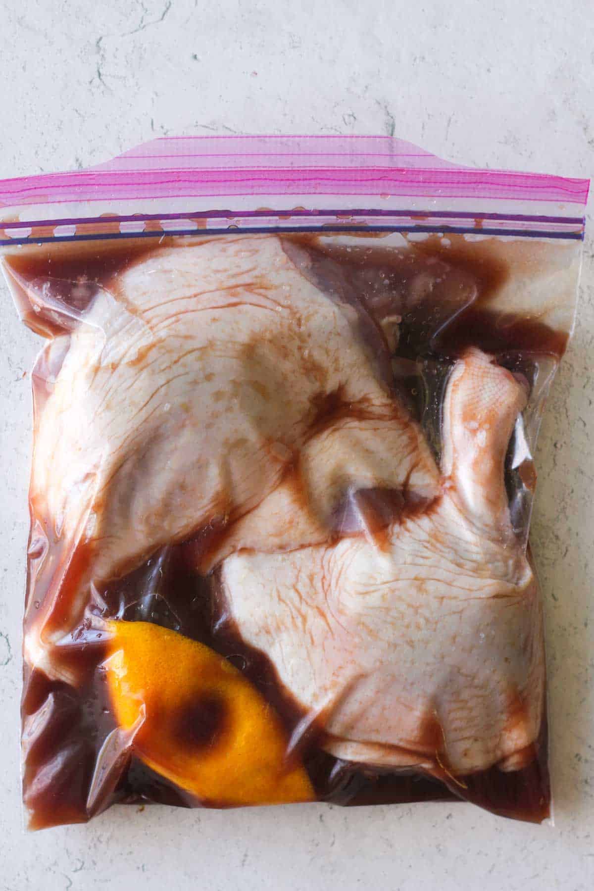 marinating duck legs in the roange soy sauce marinade