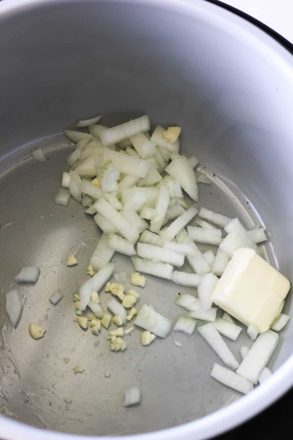 sauteing onions with garlic in butter