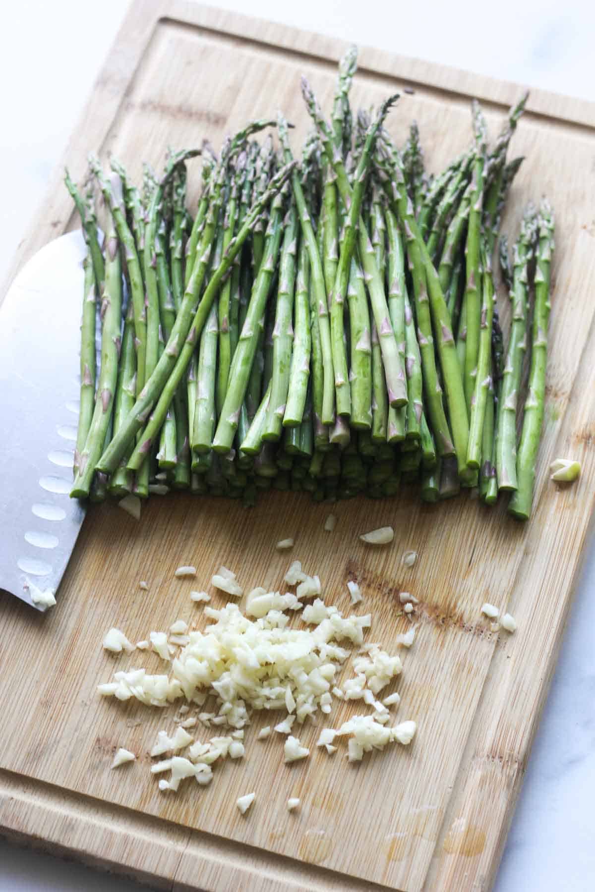 raw asparagus and chopped garlic