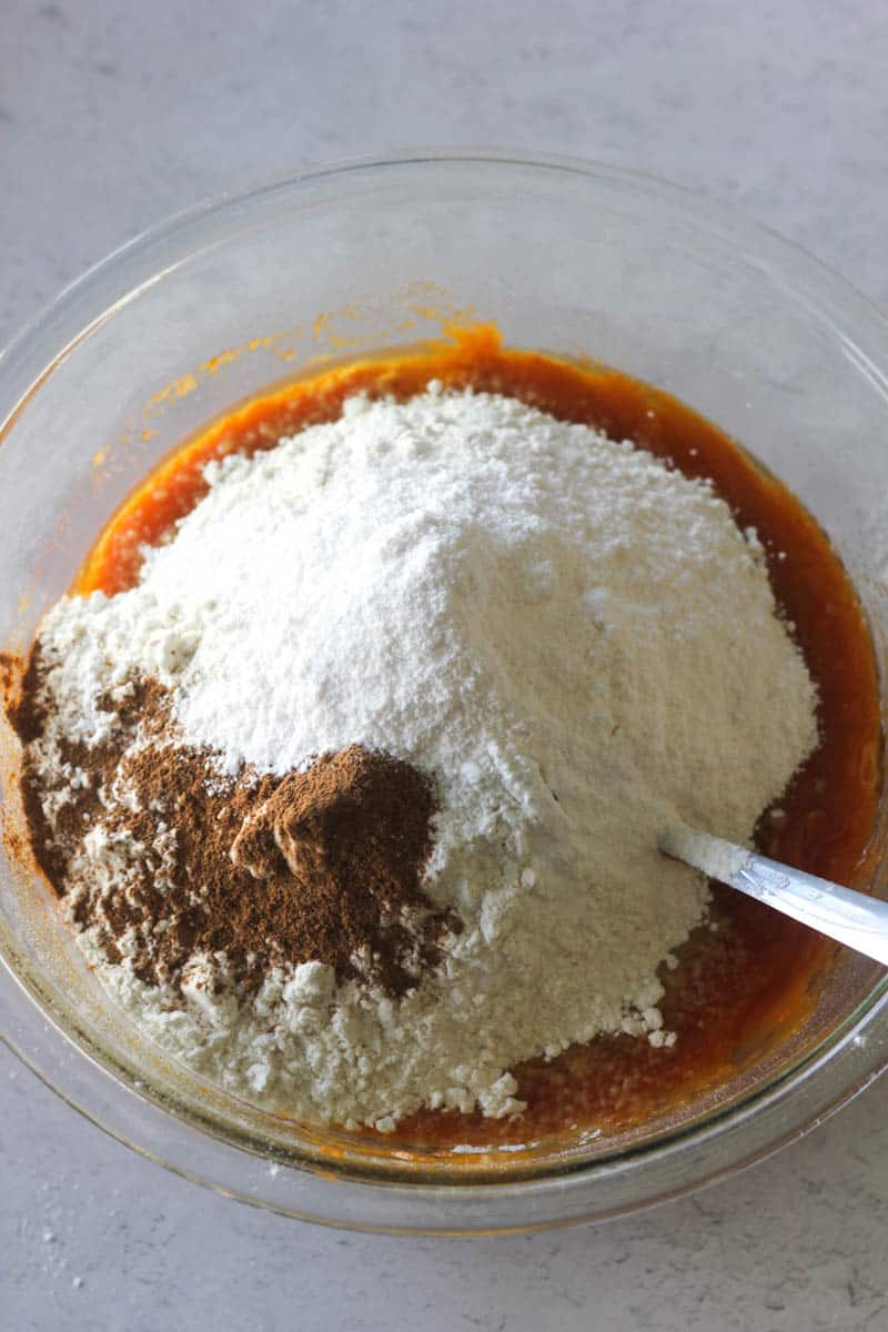 flour, spices on top of batter