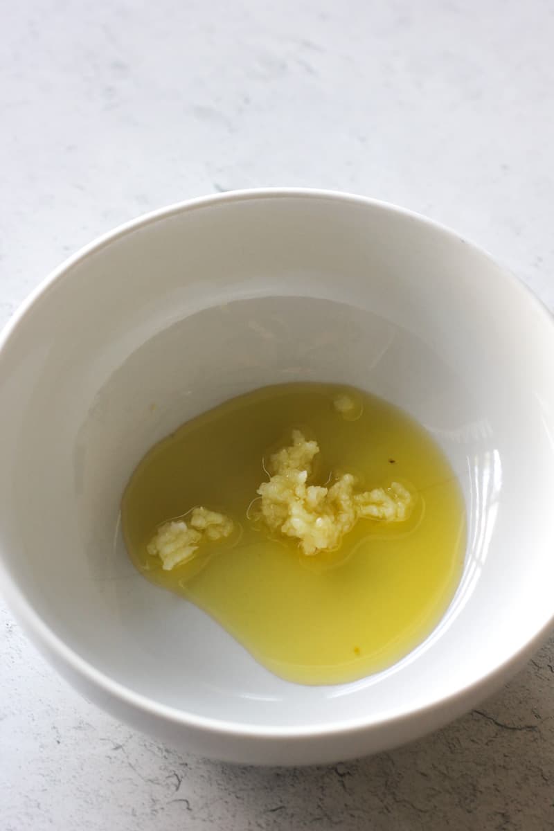 olive oil and minced garlic in the bowl