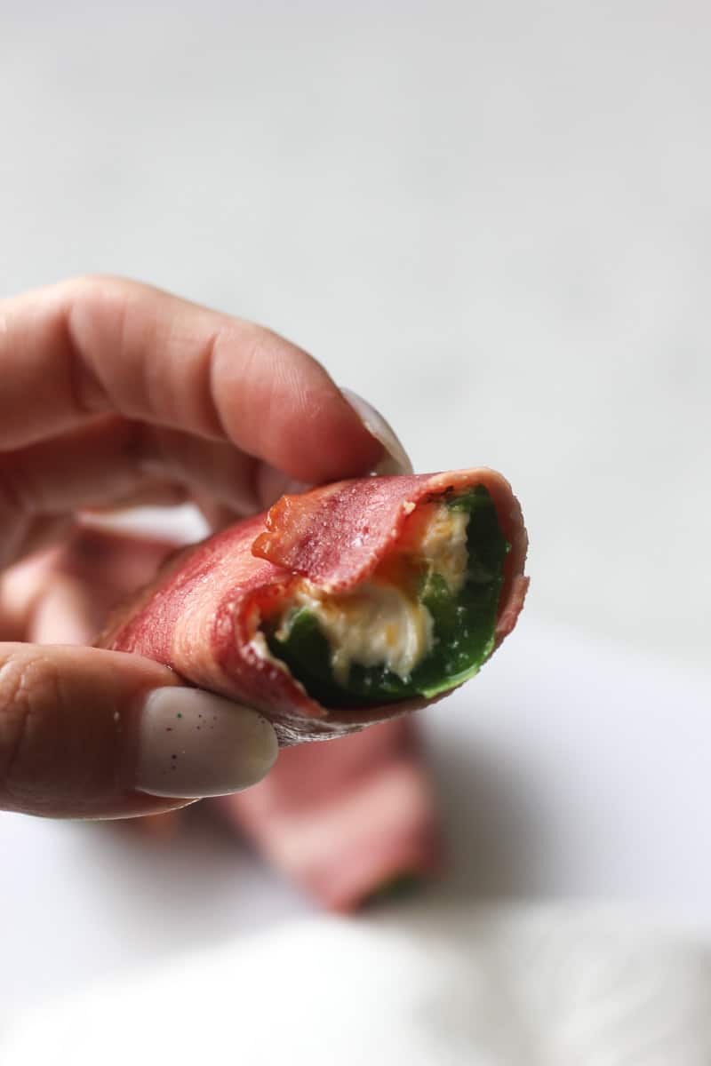 a bite of turkey bacon wrapped jalapeno peppers