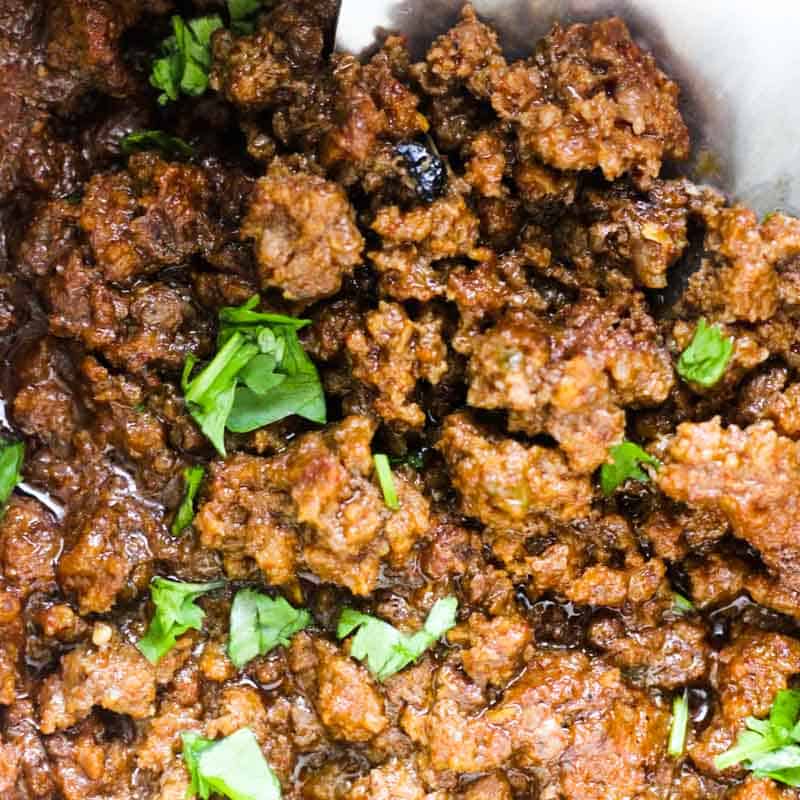 browned and cooked beef with cilantro