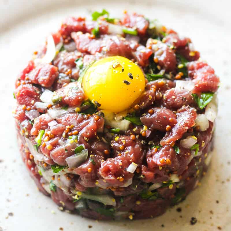 bison tartare with quail egg on top