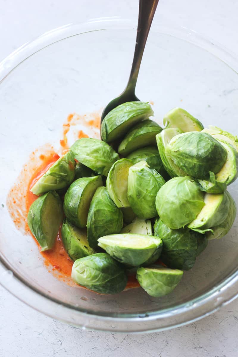 adding raw brussels sprouts to the sauce