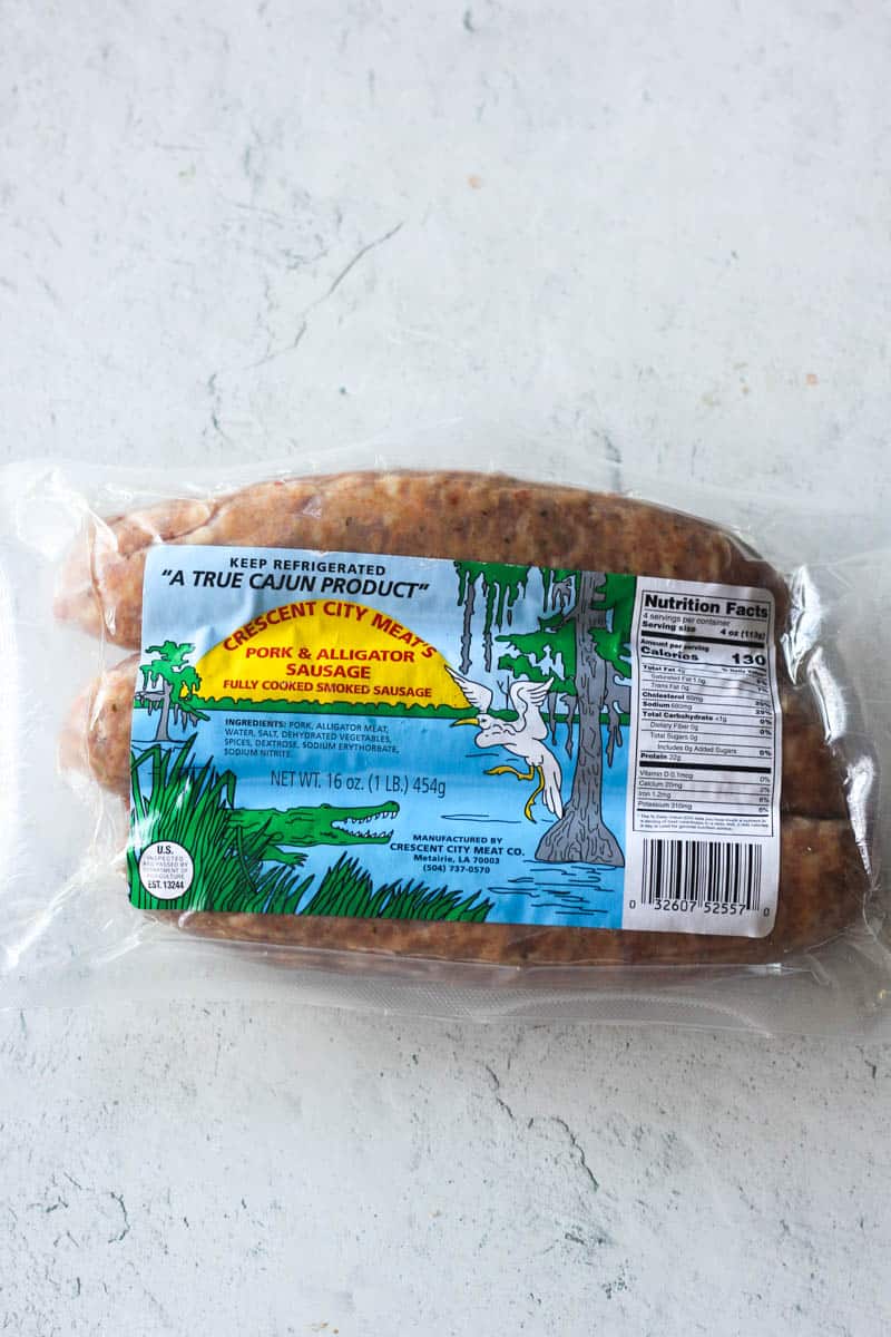 a package of alligator sausages on the table