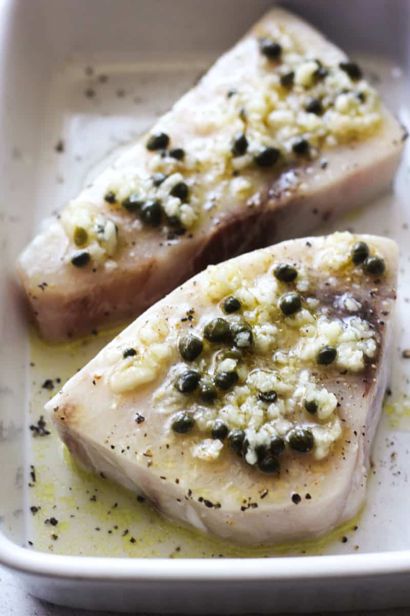 raw swordfish with chopped garlic oil and capers