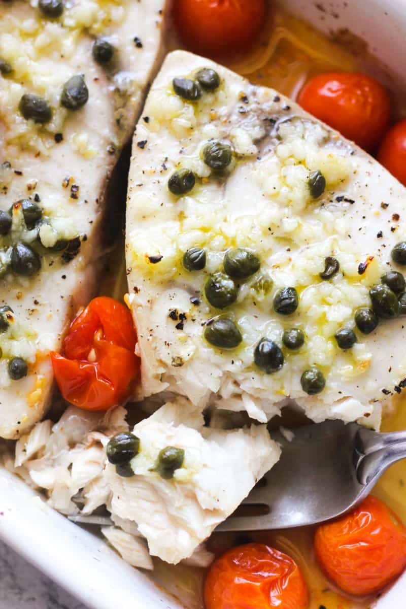 baked swordfish with capers and cherry tomatoes and minced garlic