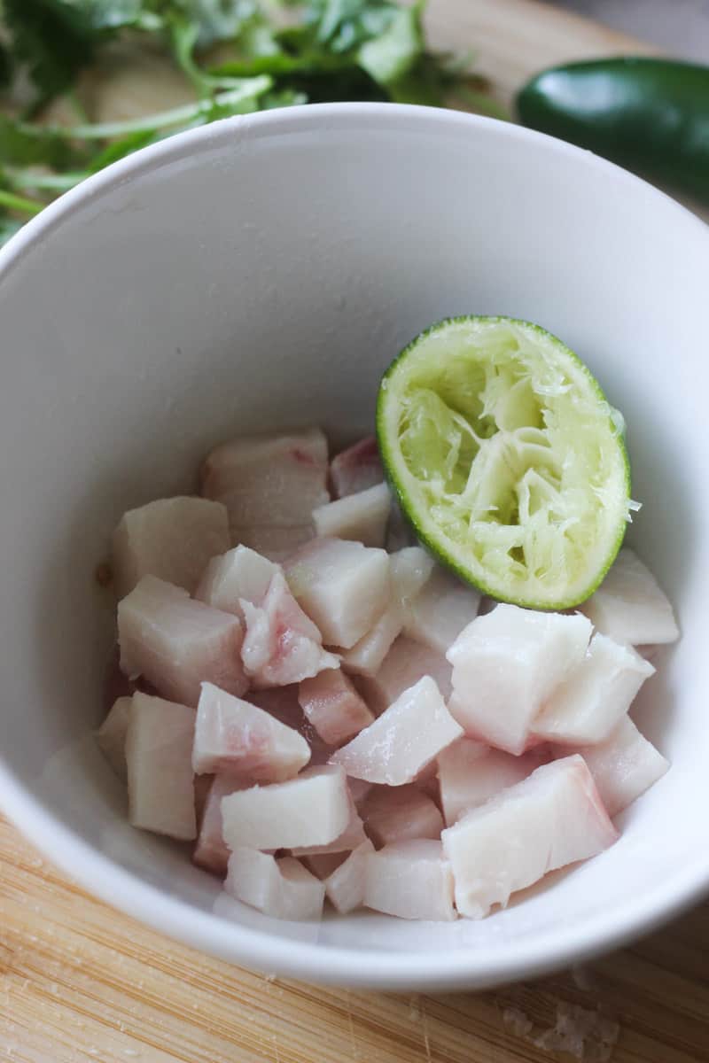 cubed cobia in the small bowl with lime