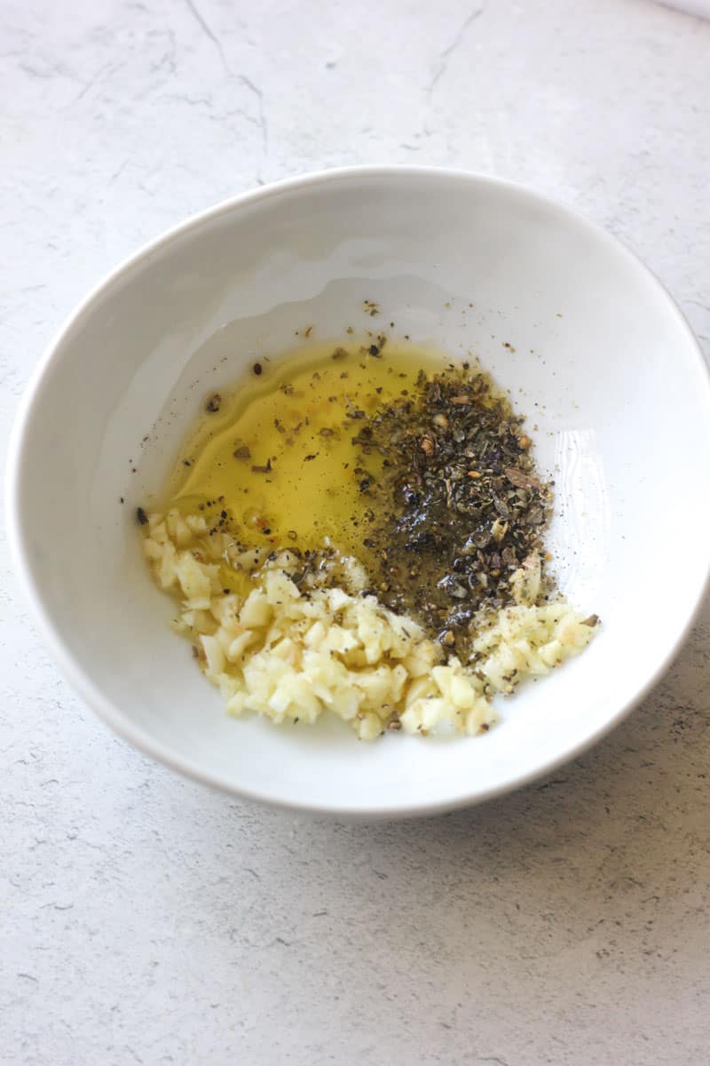 olive oil, chopped garlic and seasonings in a small bowl