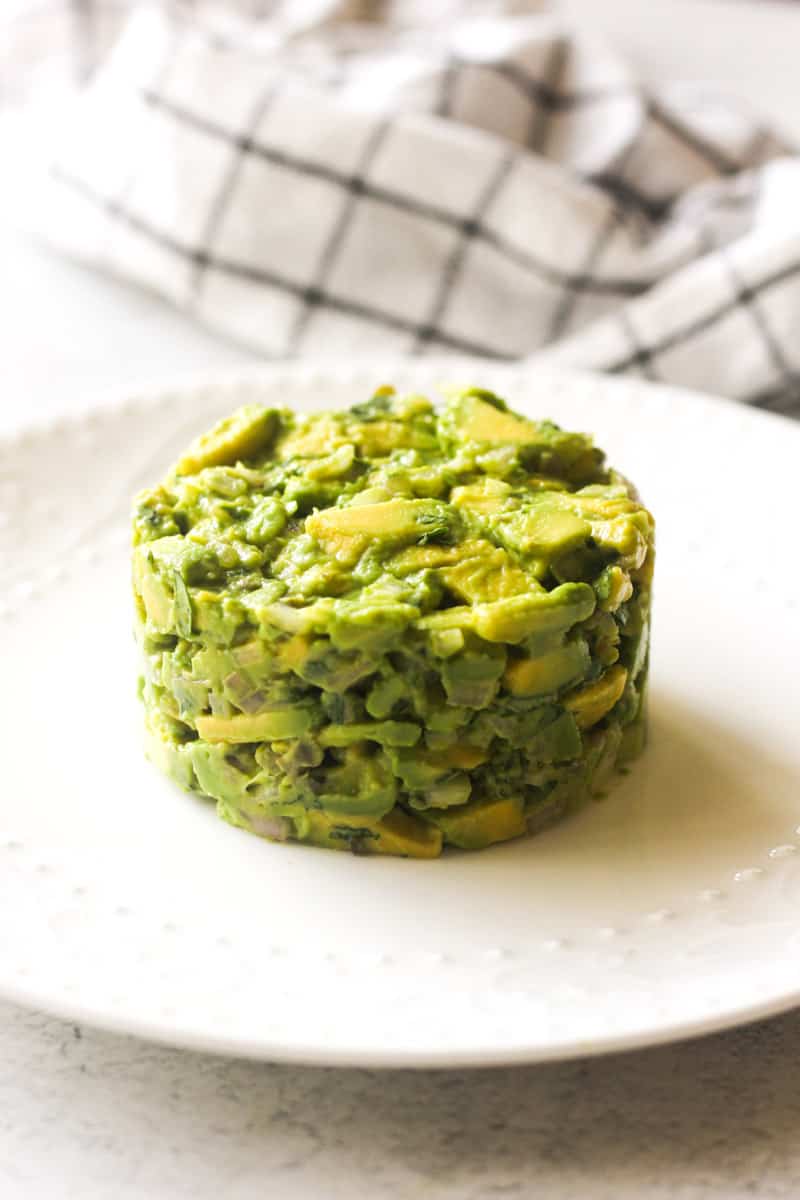 avocado tartare on the white plate