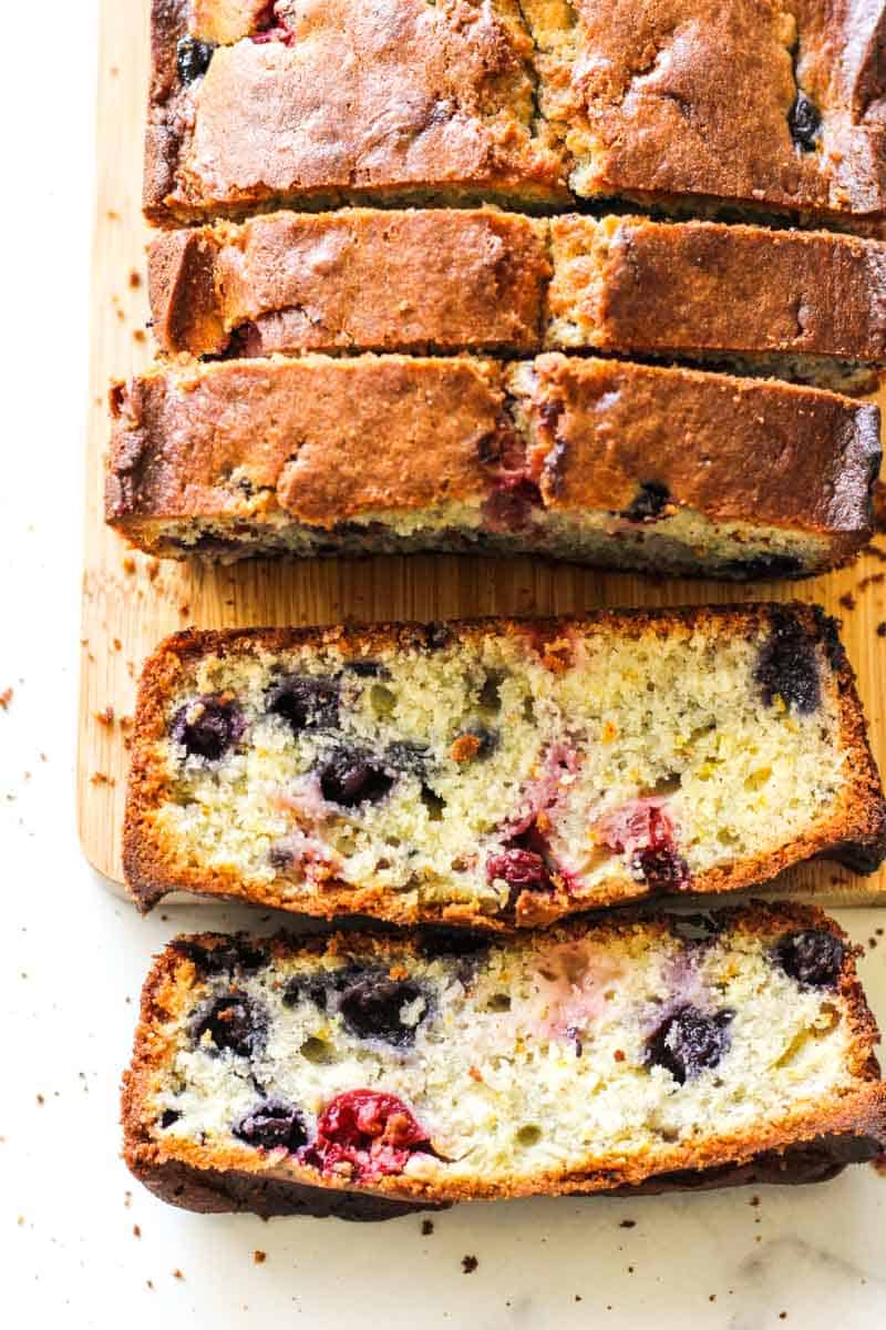 sliced cranberry blueberry bread on the table